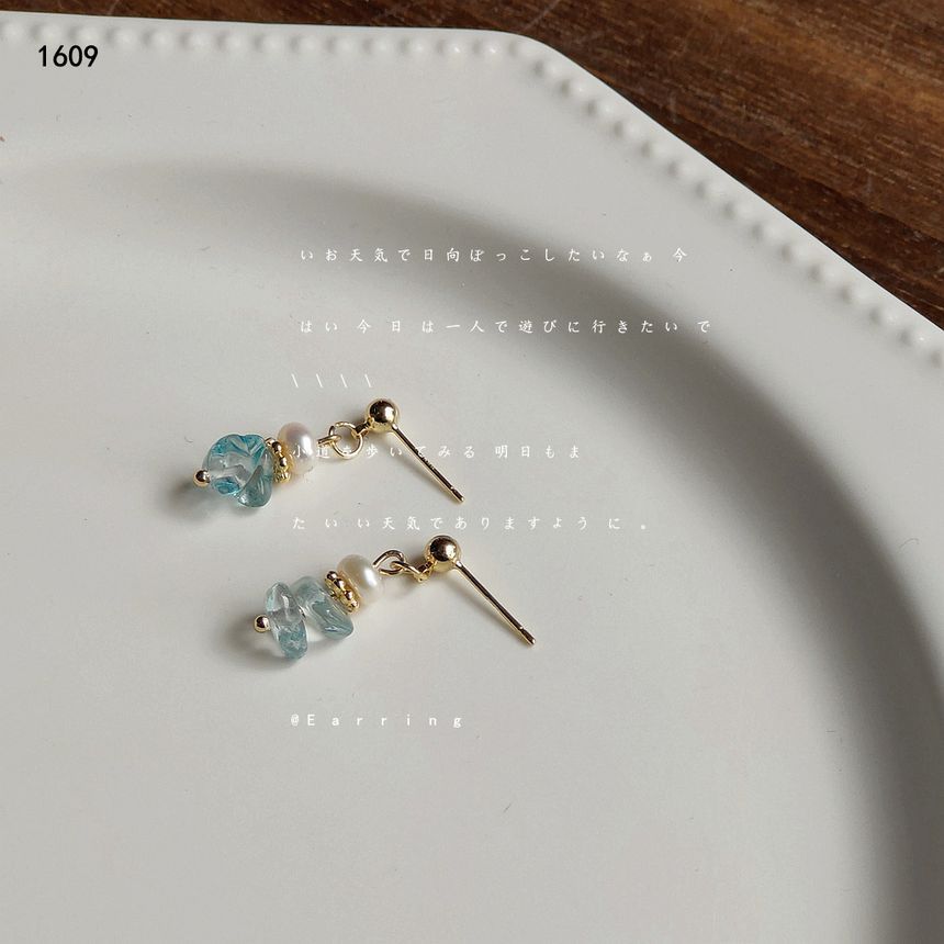 Boucles d'oreilles pendantes en argent sterling avec fausses perles