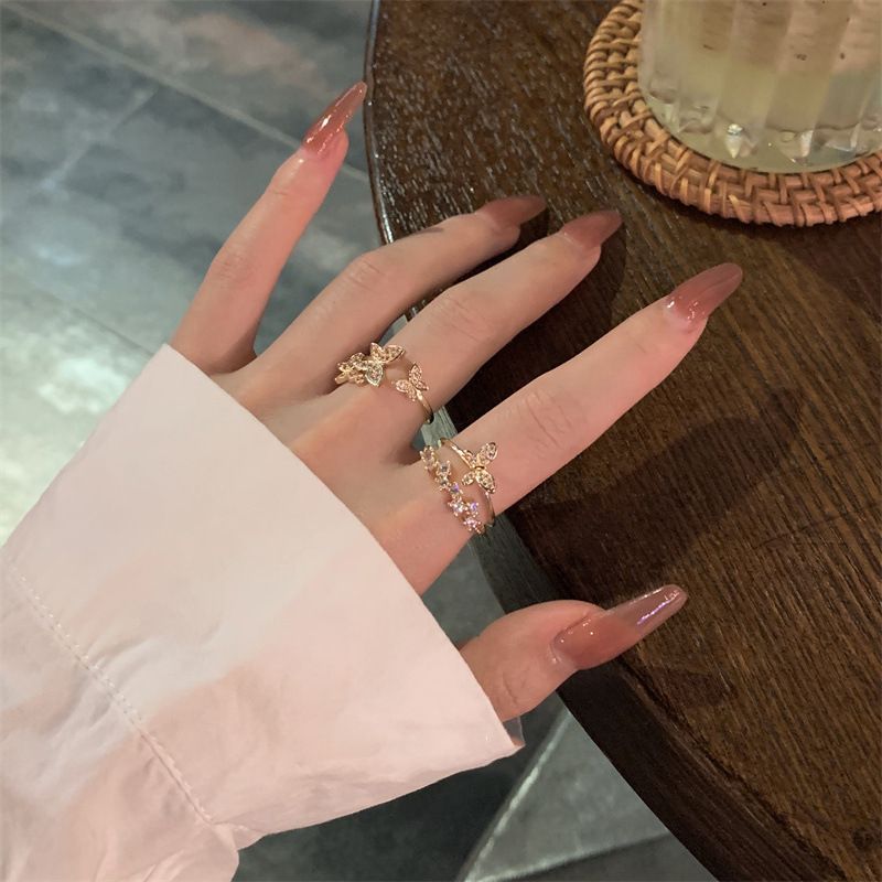 Bague ouverte en alliage avec strass papillon (différents modèles)