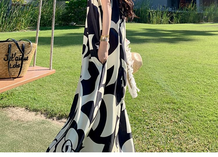 Robe d'été mi-longue à imprimé floral et col licou