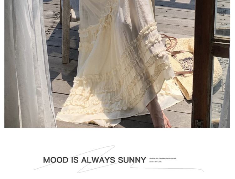 Robe longue à volants unis et col licou