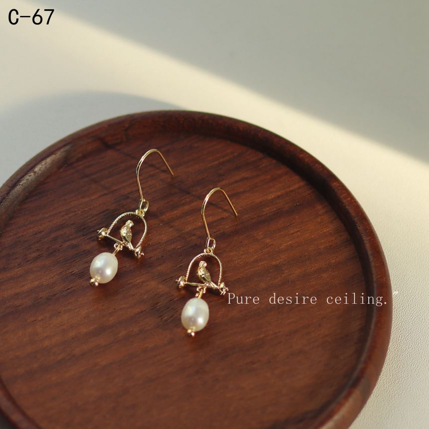 Boucles d'oreilles pendantes en fausses perles