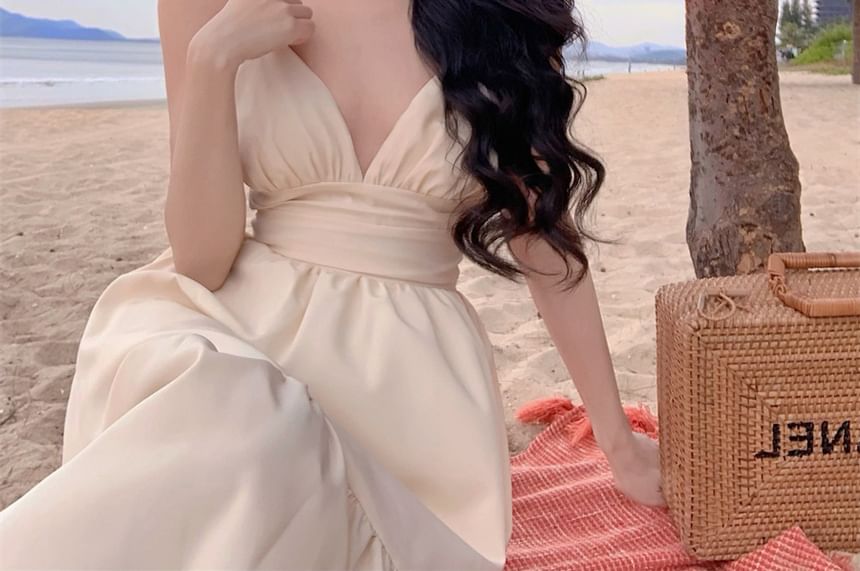 Robe midi unie à bretelles spaghetti et dos ouvert A