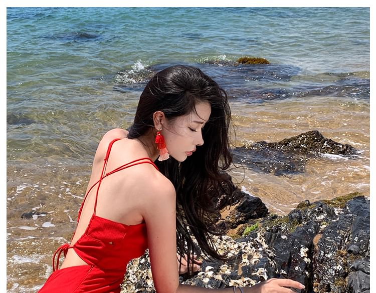 Robe mi-longue unie à bretelles spaghetti et fente découpée