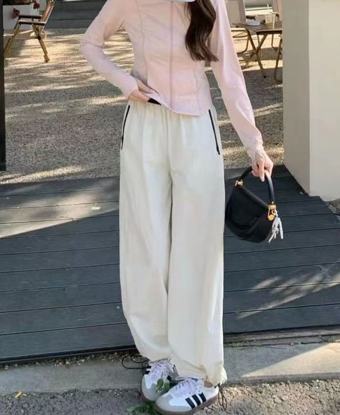 Poche zippée contrastée, taille haute, cordon de serrage, fronces