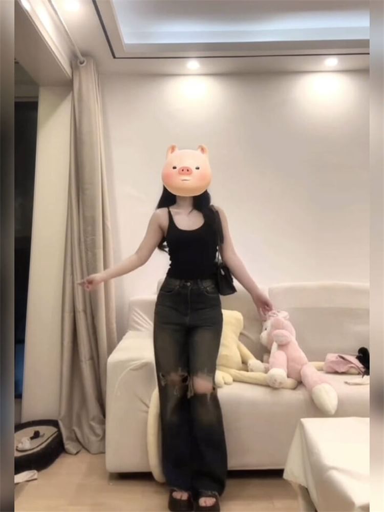 Jean large taille haute délavé et déchiré