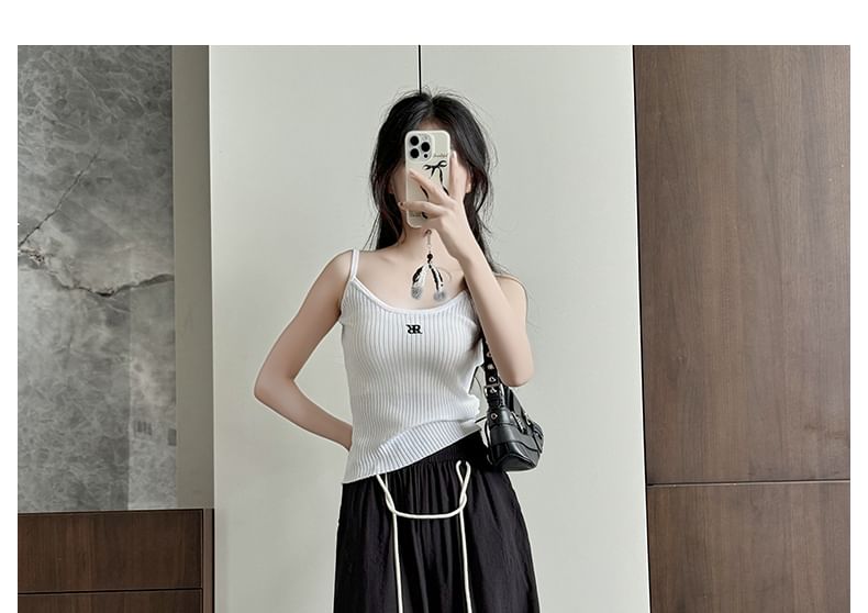 Pantalon drapé taille haute à jambes larges et à cordons contrastants