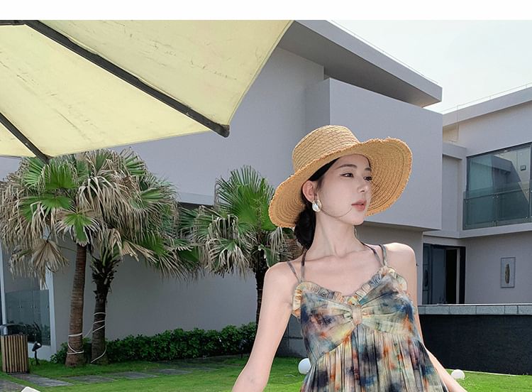 Robe d'été mi-longue à bretelles spaghetti et imprimé floral