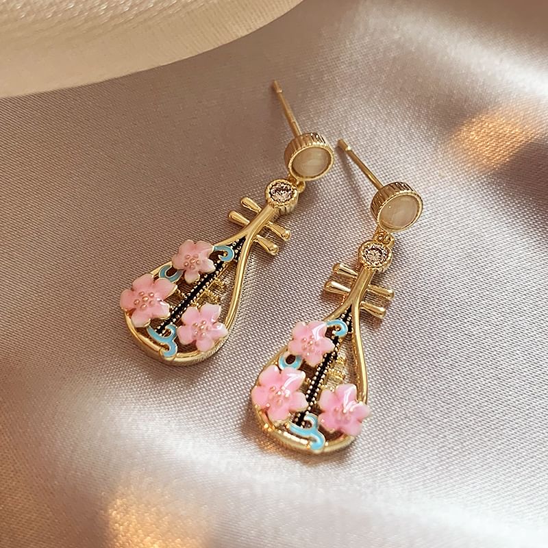 Boucles d'oreilles pendantes en alliage avec instrument de musique floral