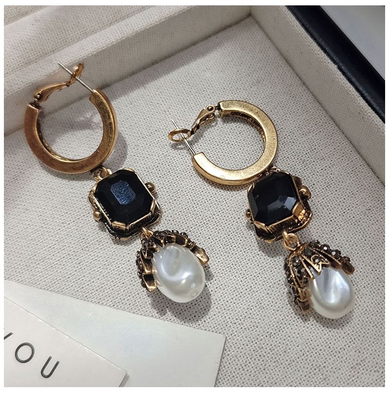 Boucles d'oreilles pendantes ornées