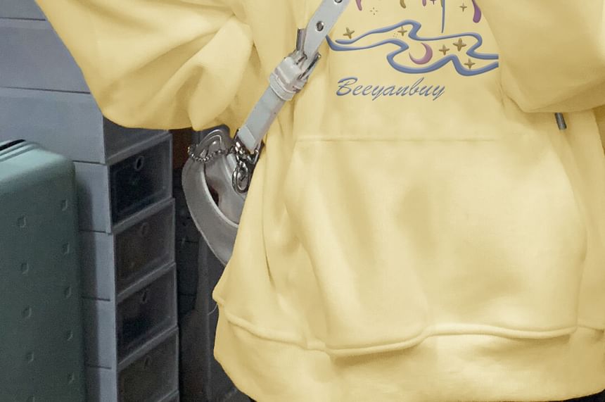 Sweat à capuche avec cordon de serrage imprimé