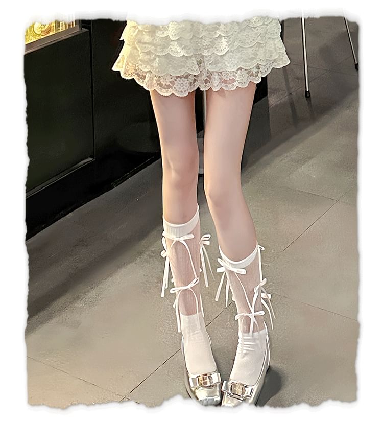 Chaussettes mi-mollet à nœud papillon