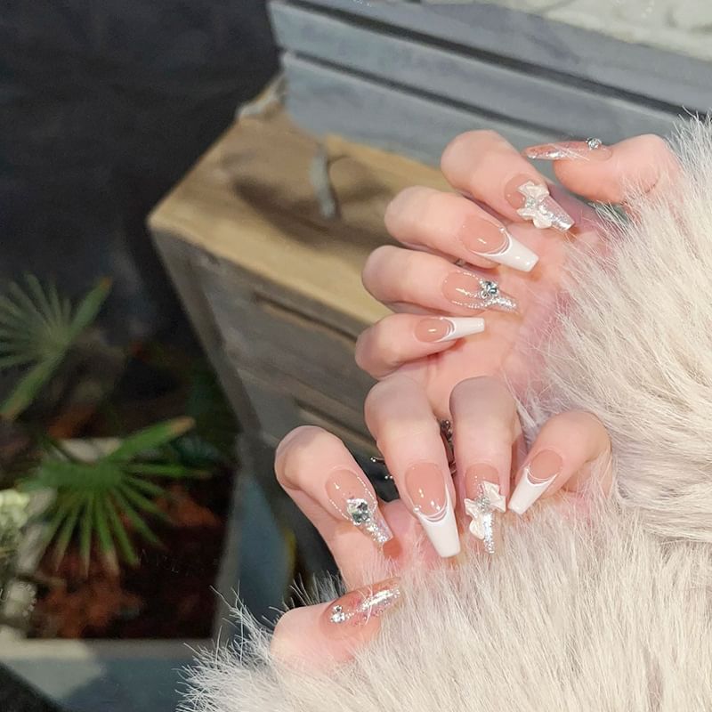 Ongle à pression en forme d'œil de chat avec nœud