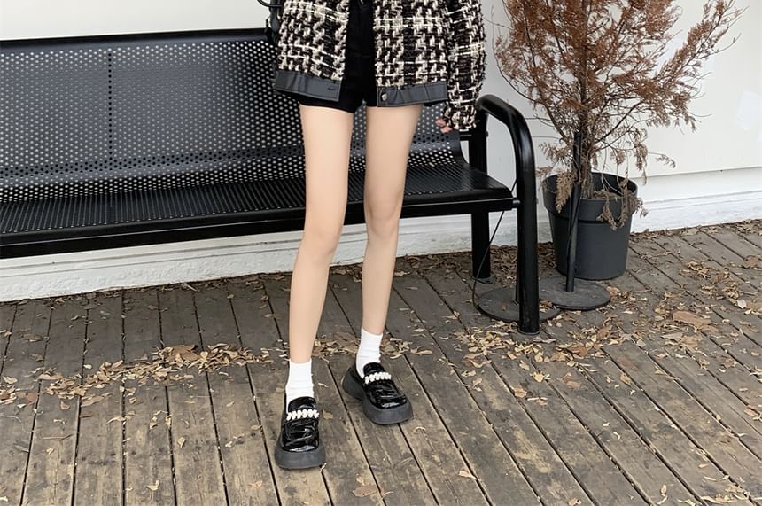 Veste boutonnée en tweed pied-de-poule à col