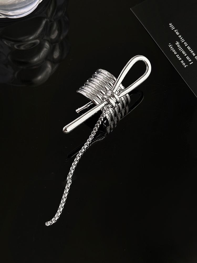 Élastique à cheveux avec détail de chaîne nouée