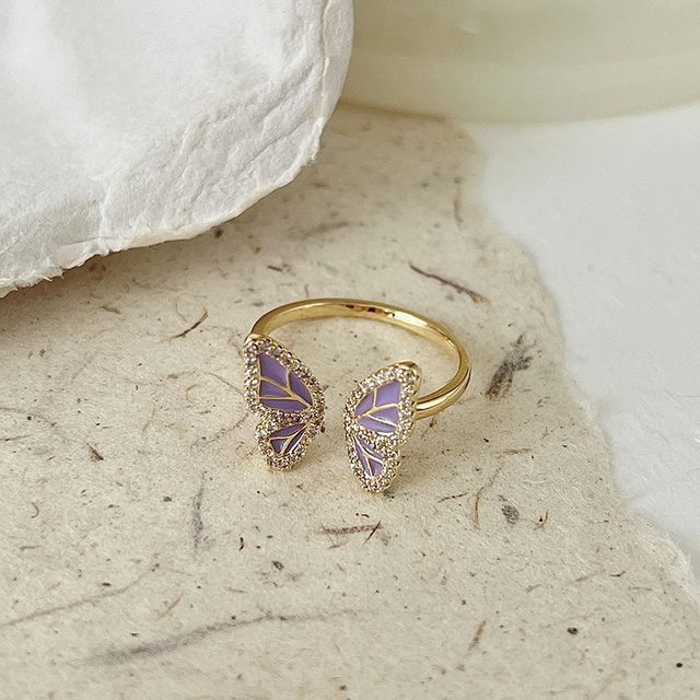 Bague ouverte en alliage avec papillon et fausses perles (divers modèles)