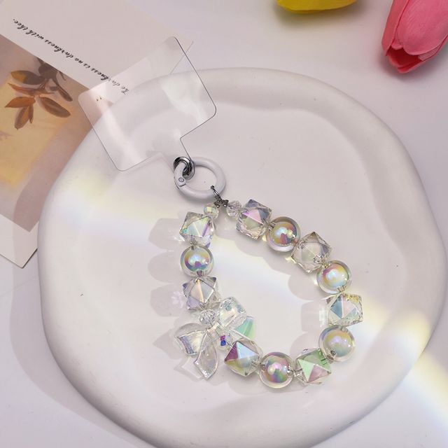 Dragonne de téléphone à perles géométriques avec cordon en perles