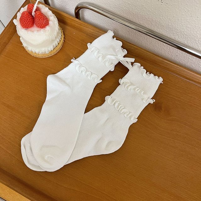 Chaussettes côtelées unies à bords ondulés