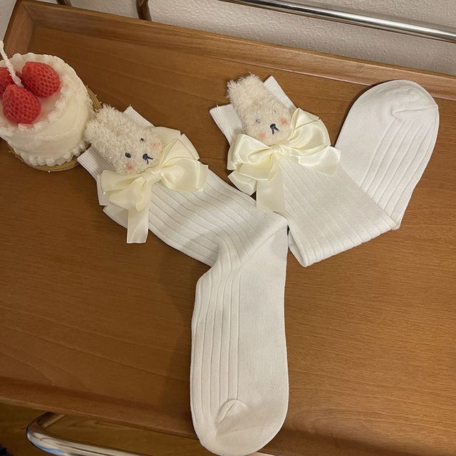 Chaussettes unies avec nœud en lapin