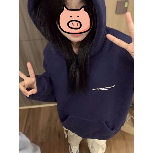 Sweat à capuche avec lettrage