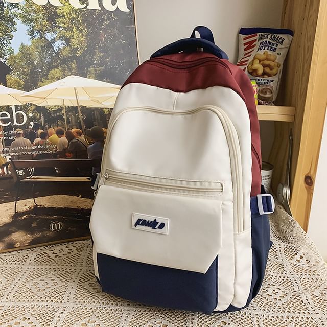 Sac à dos avec logo lettrage / breloque nœud / ensemble