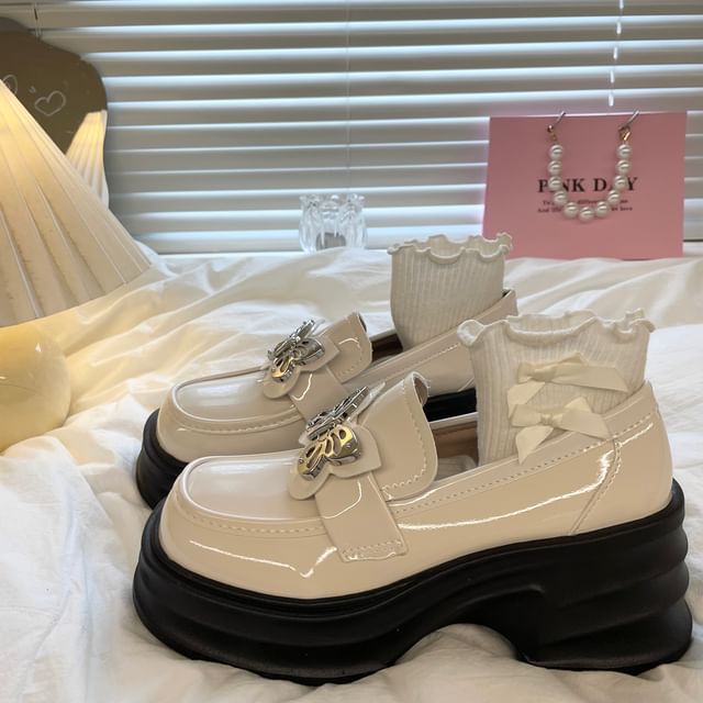 Mocassins à plateforme papillon