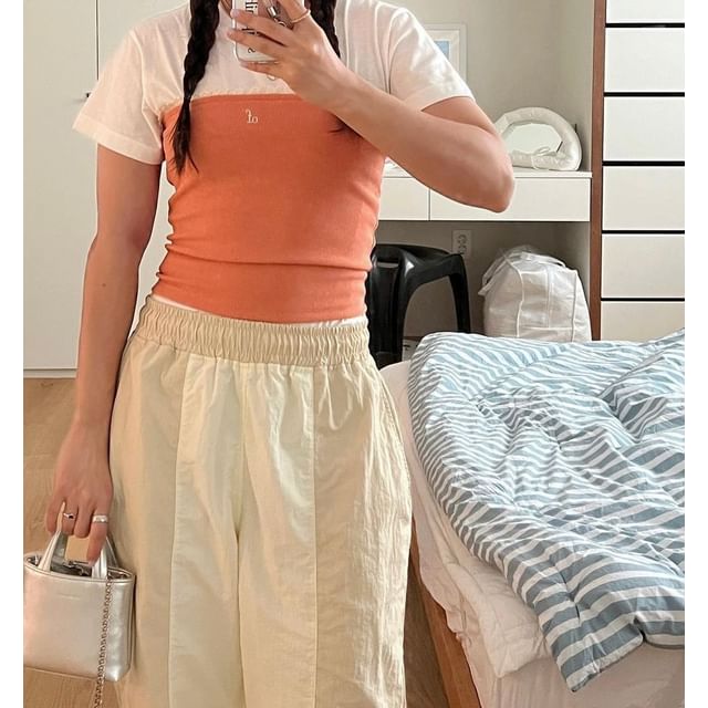 Haut tube avec bordure en dentelle et lettrage