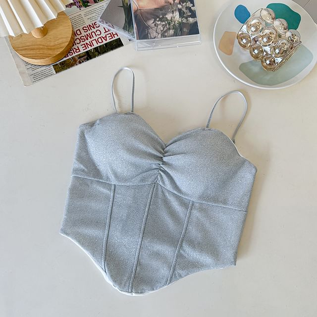 Haut caraco court asymétrique uni