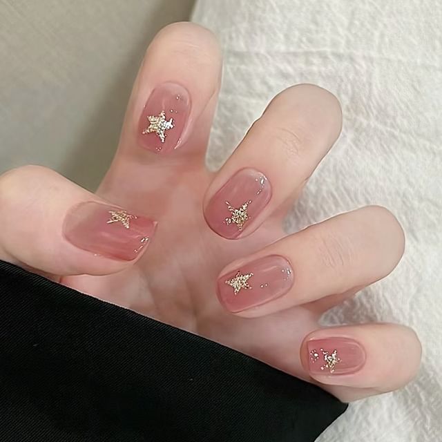 Ongles à pression en forme d'étoile