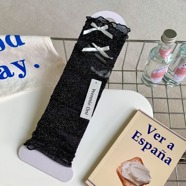 Beinstulpen aus Mesh mit Schleife