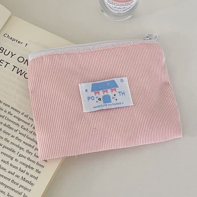 Porte-monnaie en velours côtelé avec appliques