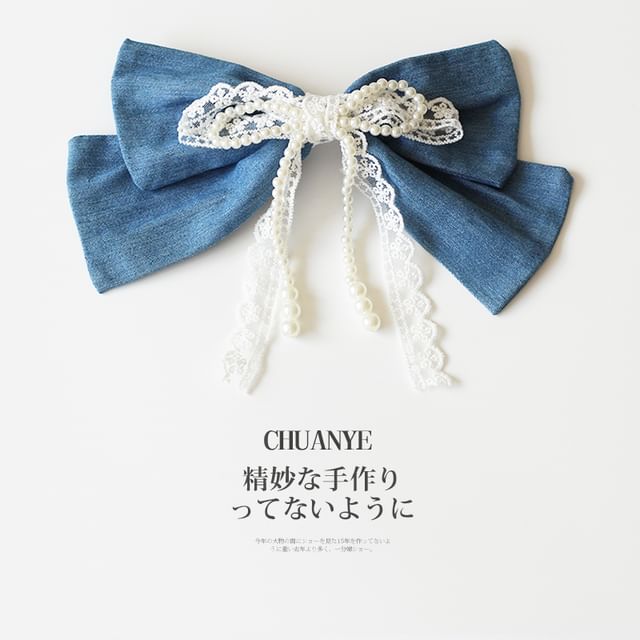 Pince à cheveux avec nœud en fausses perles