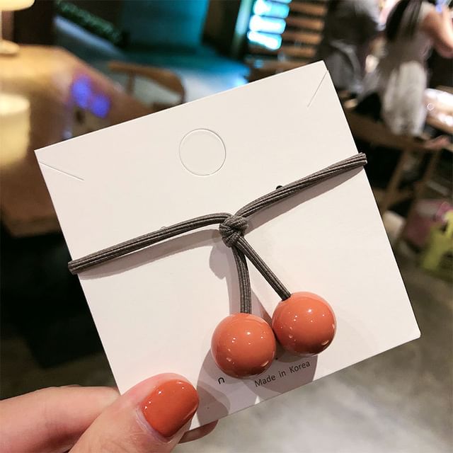 Élastique à cheveux en boule unie