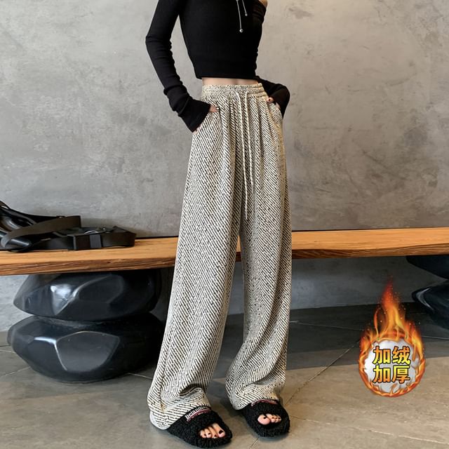 Pantalon à jambe large doublé en polaire avec cordon de serrage à la taille