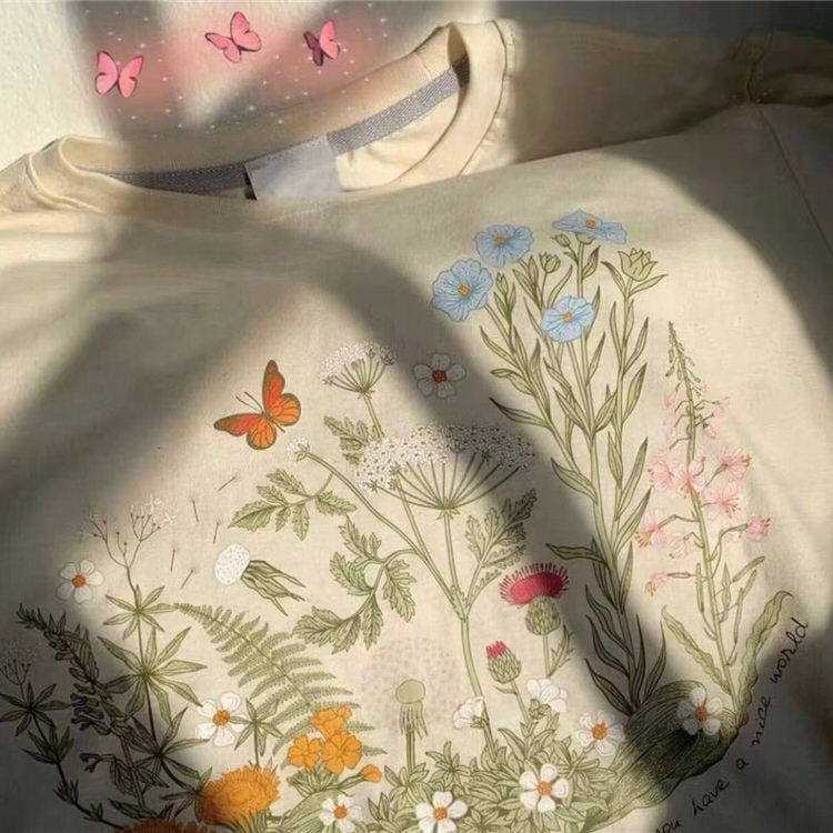 T-Shirt mit Blumenmuster und Pflanzenmotiv