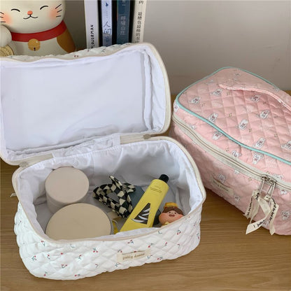 Trousse de maquillage matelassée à motifs