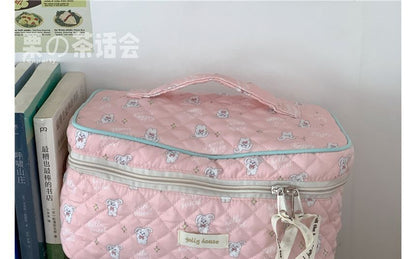 Trousse de maquillage matelassée à motifs