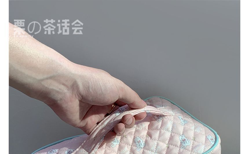 Trousse de maquillage matelassée à motifs