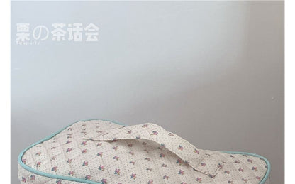 Trousse de maquillage matelassée à motifs