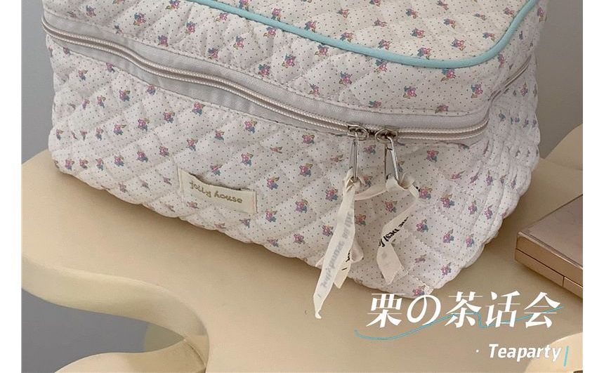 Trousse de maquillage matelassée à motifs