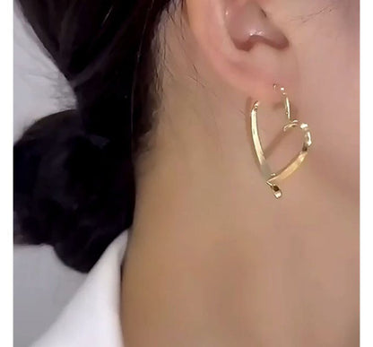 Alloy Earring Through Heart