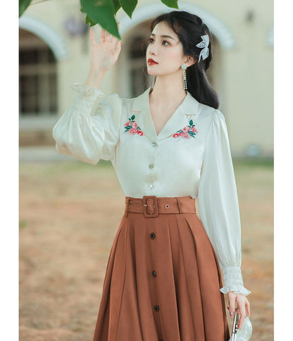 Long-Sleeve Collared Floral Embroidered Blouse / High Waist Plain Pleated Belted Midi A-Line Skirt / Set