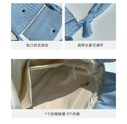 Sac bandoulière à rabat matelassé