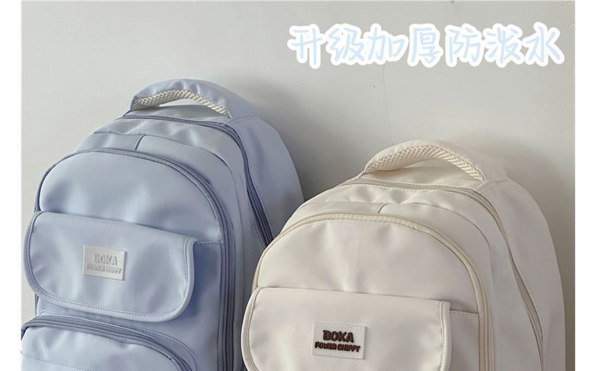 Plain Lettering Logo Buckled Backpack