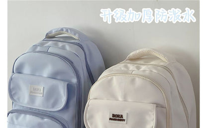 Plain Lettering Logo Buckled Backpack