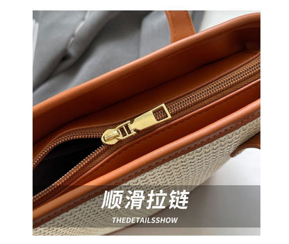 Sac seau tissé avec empiècement en similicuir