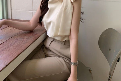 Sleeveless Asymmetrical Neck Plain Bow Blouse