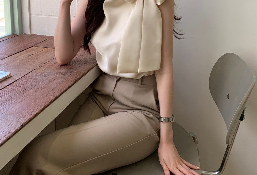 Sleeveless Asymmetrical Neck Plain Bow Blouse