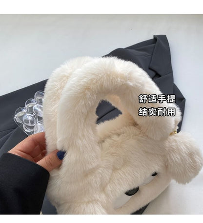 Sac à bandoulière moelleux brodé avec œil