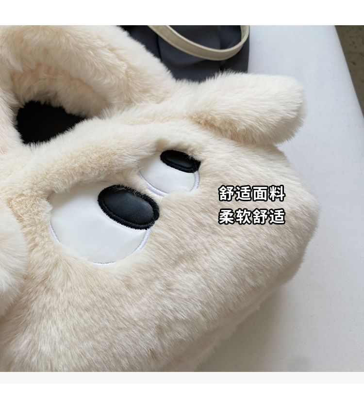 Sac à bandoulière moelleux brodé avec œil