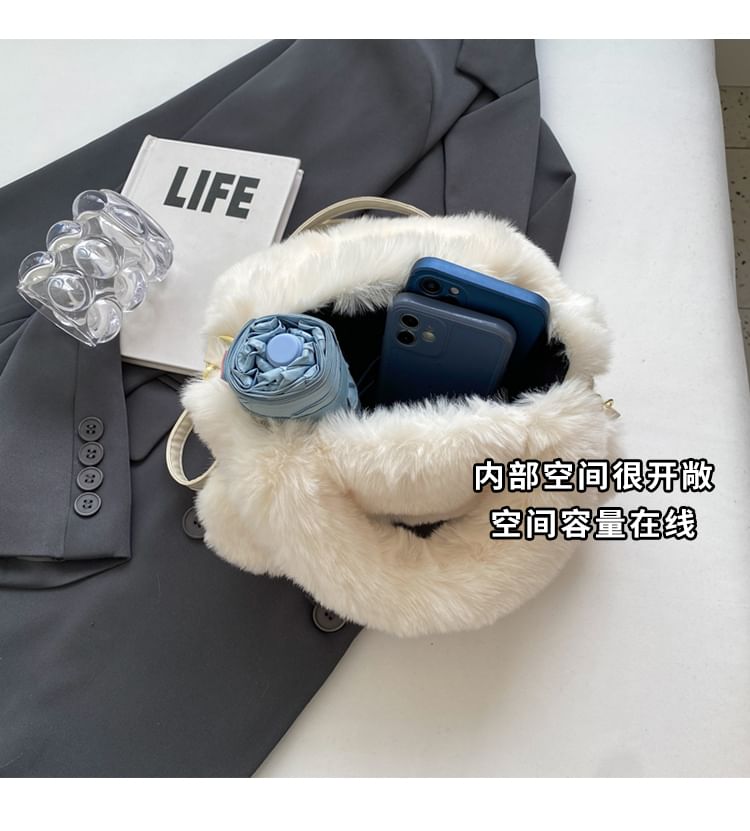 Sac à bandoulière moelleux brodé avec œil